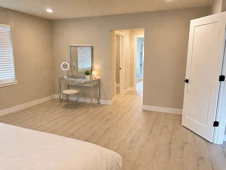 Master Bedroom, 2 walk in closets and entrance to the master bathroom.