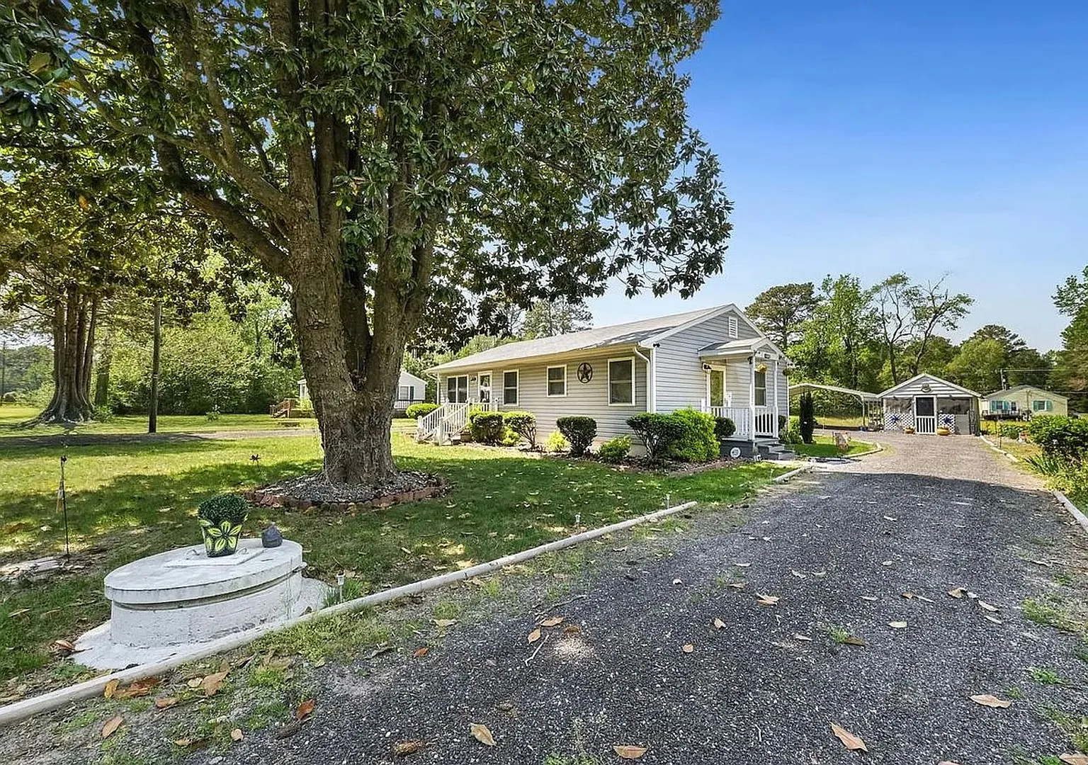 Charming White Stone Home on 0.60 Acres | 3BR/1.5BA | Gazebo, Carport & Storage | Available Septe... — Photo 4