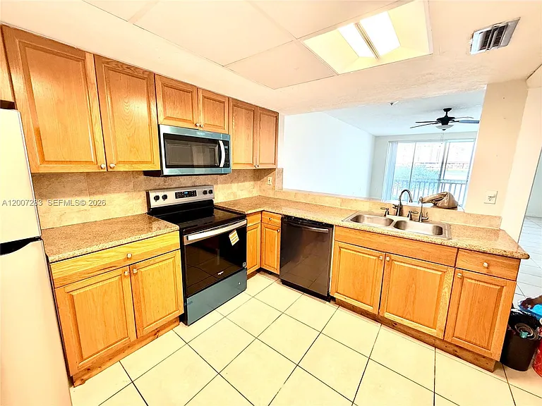 1591 NE Miami Gardens Dr #205 — Photo 17