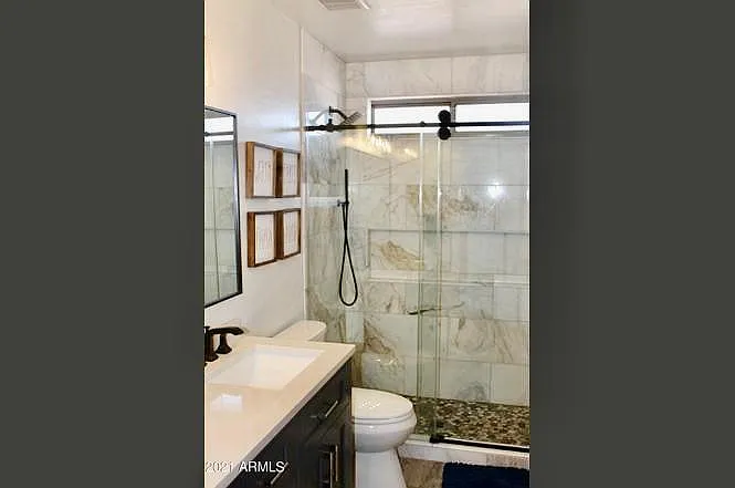 Upstairs bathroom was renovated. New flooring, vanities and spa-like shower.