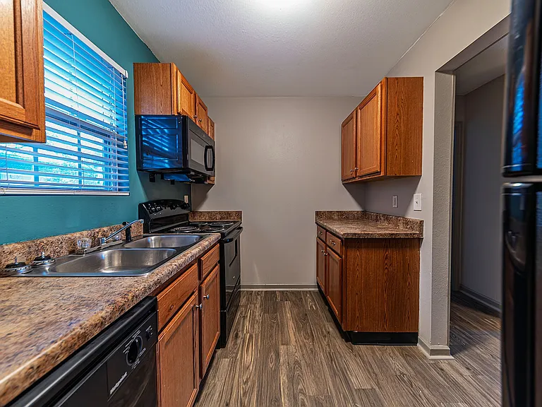 Experience culinary delight in this modern kitchen featuring stylish finishes.