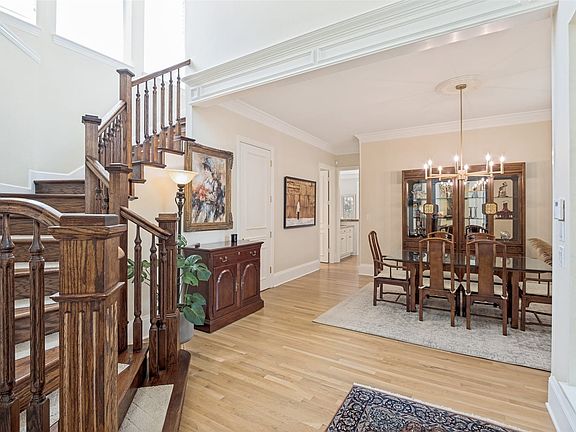Foyer with formal dining room on the right and to the left is the formal living room.