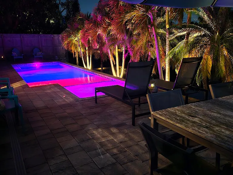 Lovely Nighttime View of Pool Deck & Canal