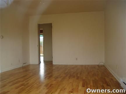 Easy care gleaming hardwoods throughout.