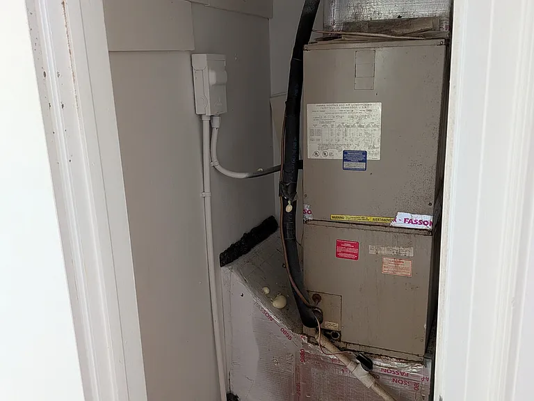 Interior utility closet with storage