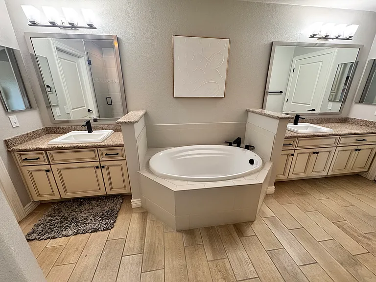 soaking tub with 2 sinks