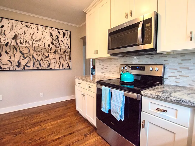 Updated kitchen with lots of storage, fully stocked for all your cooking needs!