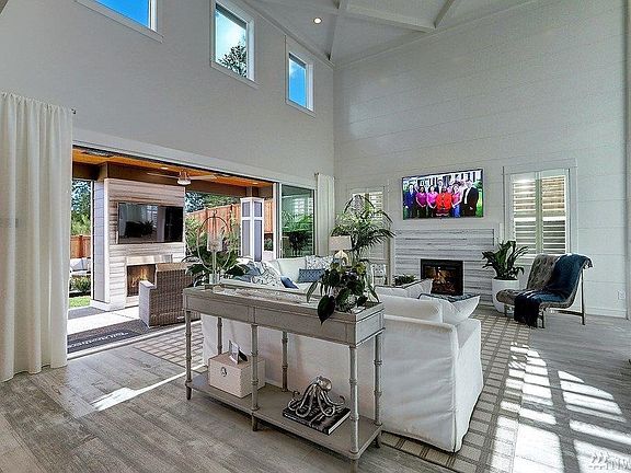 Great room to covered patio.  Photo not of actual home - may contain optional features.