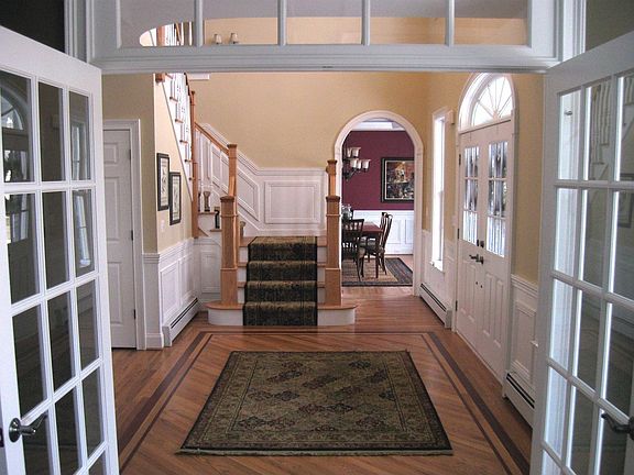 The Foyer connects the Living and Dining Rooms.