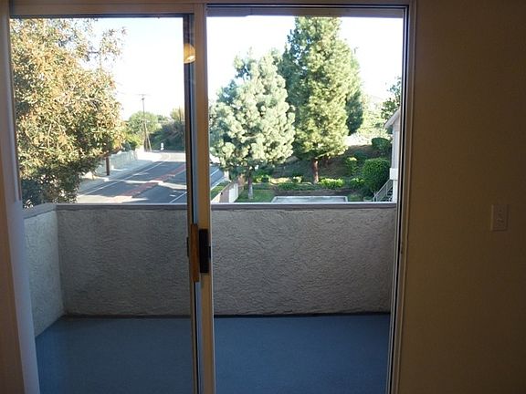 BALCONY OFF DINING ROOM WITH VIEW