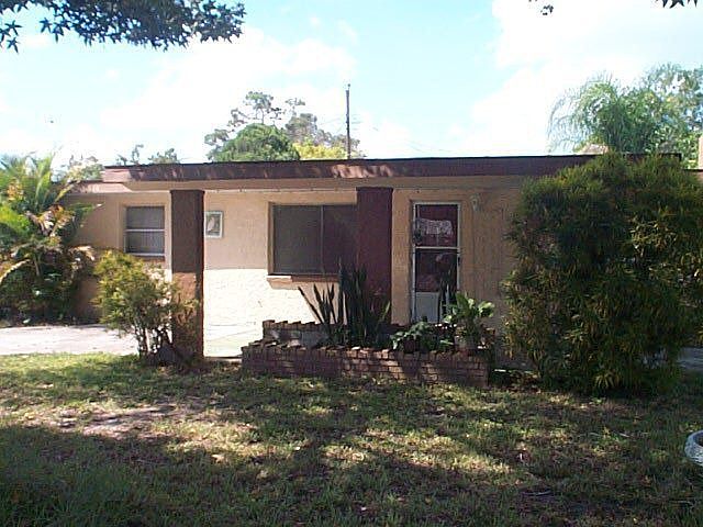 Front View With Circular Driveway