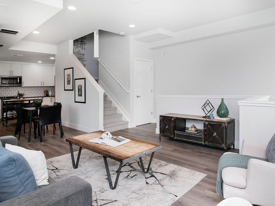 Living Room, Dining and Kitchen in the background.