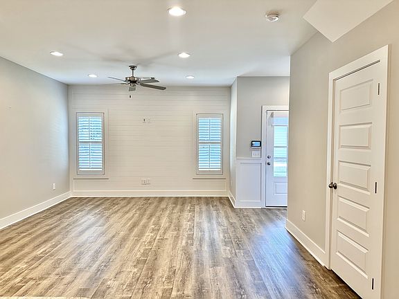 This is the view of the front entryway and Livingroom from the kitchen vantage point.