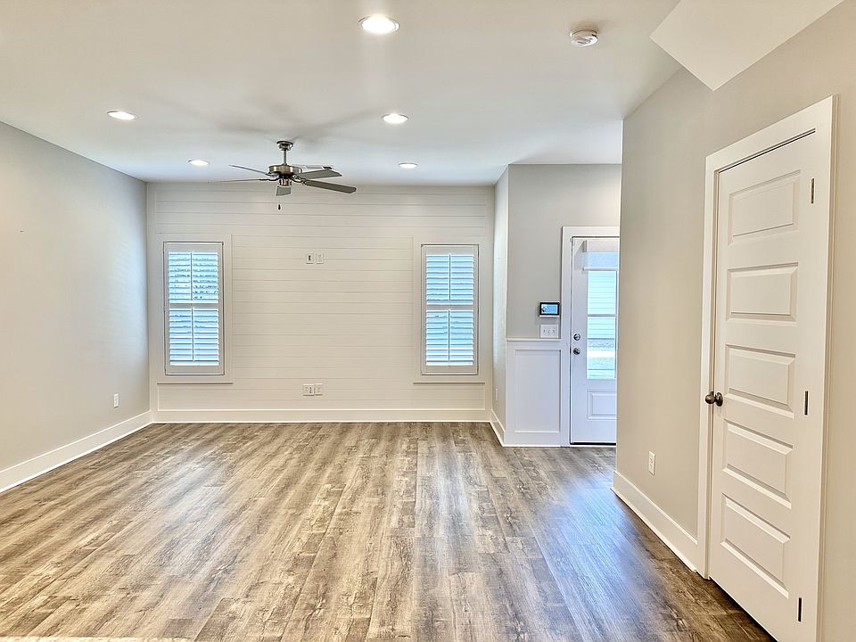 This is the view of the front entryway and Livingroom from the kitchen vantage point.