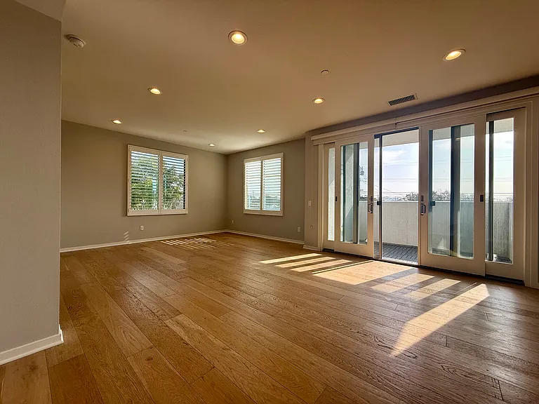 Living/Dining and doors to balcony
