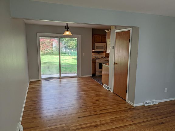 Living room looking into dining room/kitchen