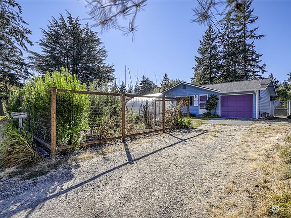 The home is a single story ranch with an attached one-car garage.  >