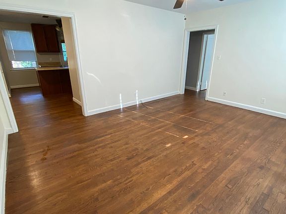 This is from the front door, living room area looking into the Kitchen.