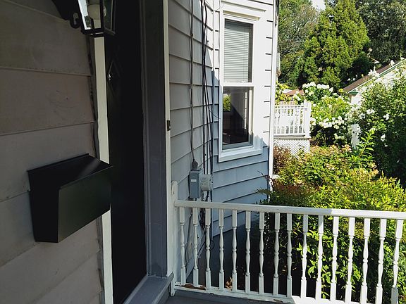 Apartment Entrance on the Side of Front Porch