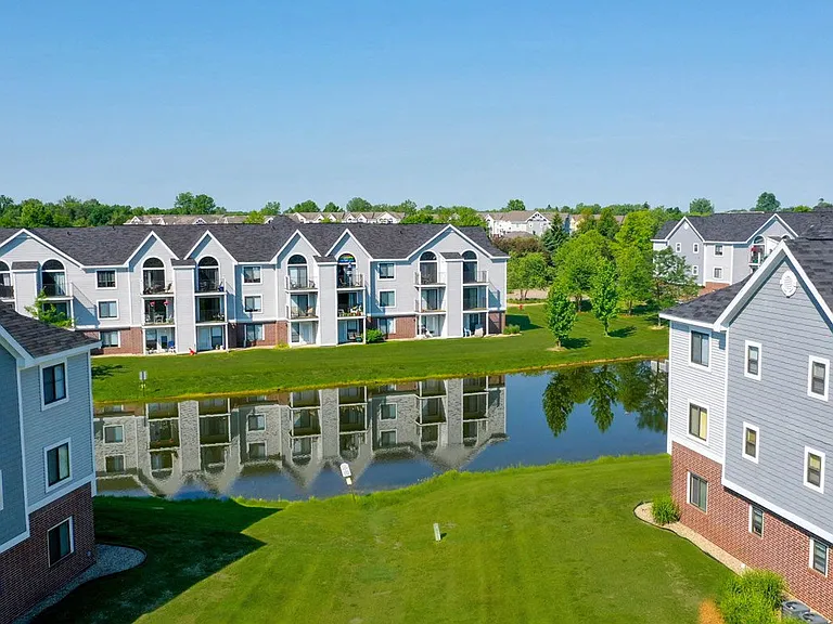 Beautiful pond and surrounding area at Heatherwood Apartments, Grand Blanc, Michigan