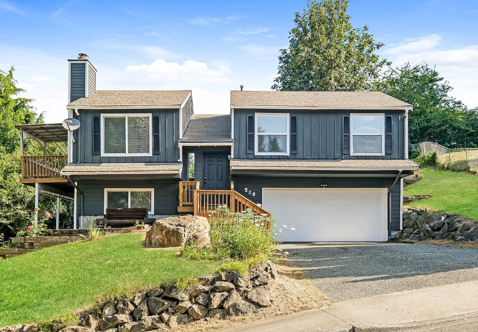 **Fully Remodeled 3+ Bedroom Home With Large Wraparound Deck Available Now For Rent** — Photo 1