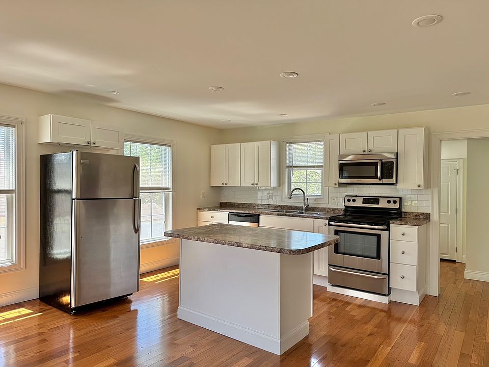 kitchen and island for additional storage, perfect for counter stools as well!