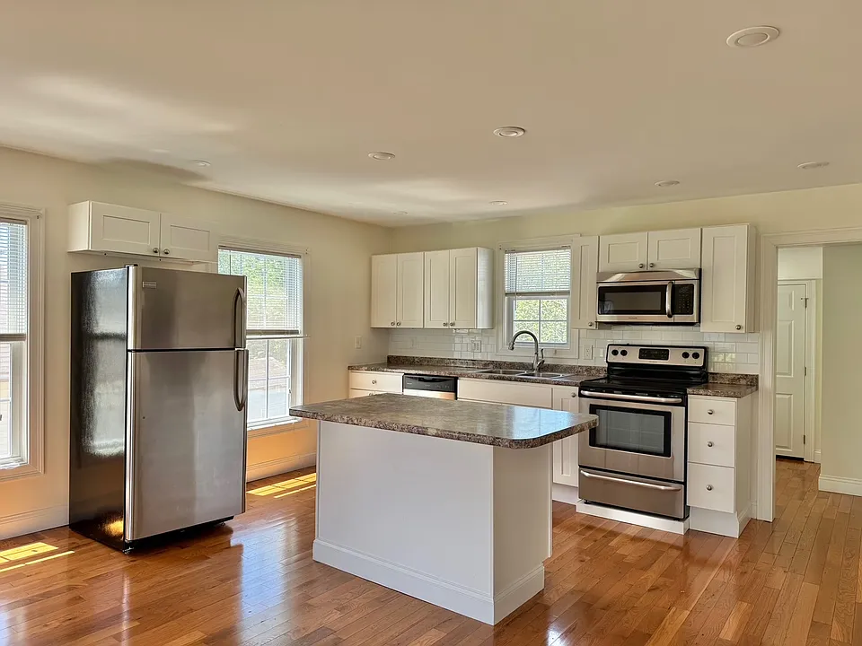 kitchen and island for additional storage, perfect for counter stools as well!
