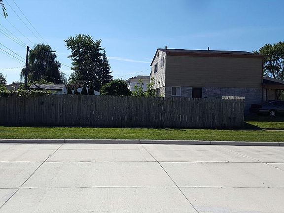 fenced yard and side view of home (corner lot)
