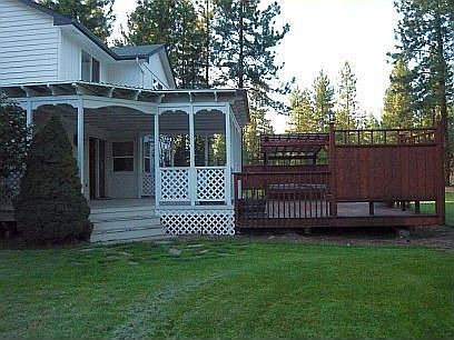 Super covered entertainment deck and 8 person hot tub 