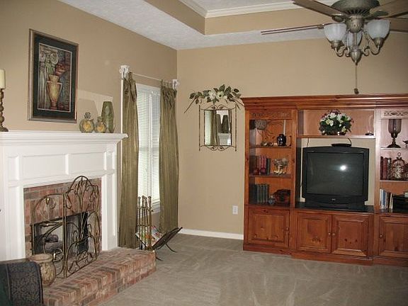greatroom with trey ceiling and FP