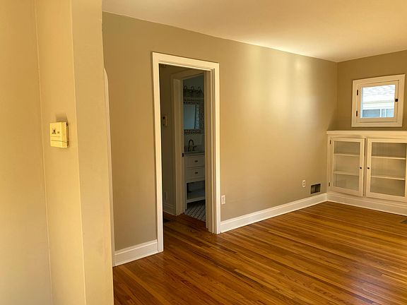 The Bathroom is just off of the hallway from the living room. Guests don't need to walk through the bedroom areas to use the bathroom.