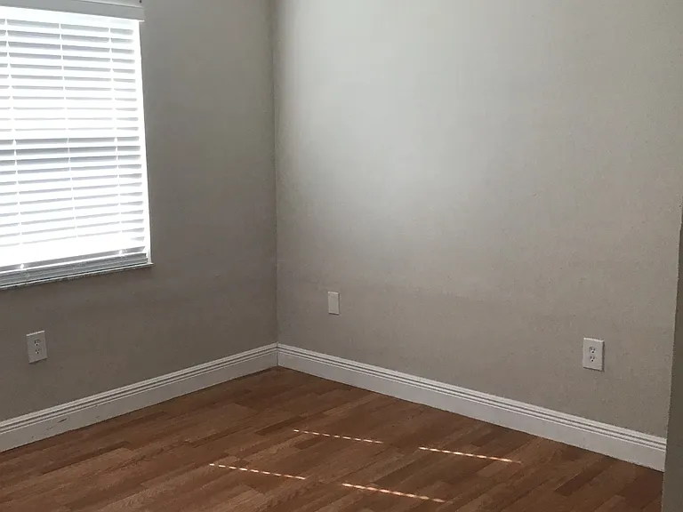 Master bedrm is approx 12 x 13 and has laminate wood plank flooring