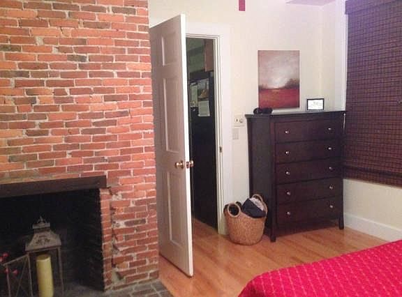 bedroom looking toward kitchen area