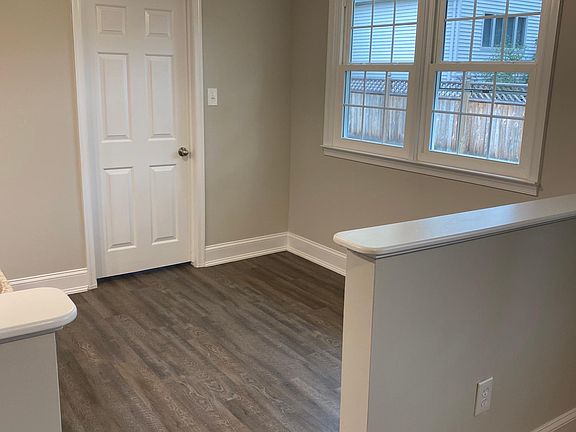 View of kitchen eating area & door to laundry room