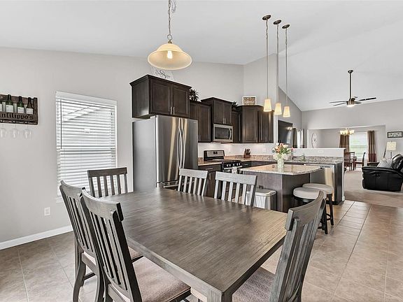Spacious open floor plan with vaulted ceilings.