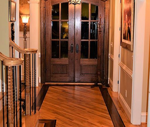Bordered hickory floor foyer