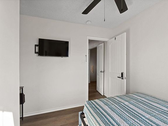 Bedroom large windows to bring in natural light.