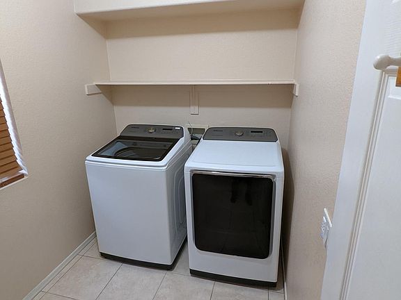 Laundry room with storage