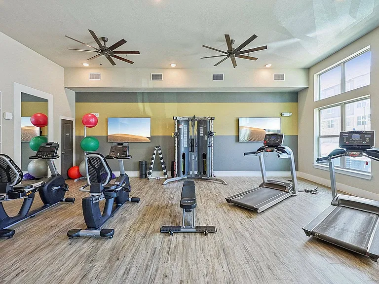 Stay fit with premium cardio and weight training equipment at McDermott 55.