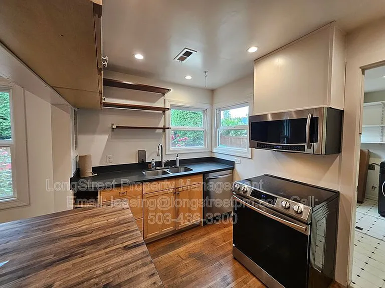 7209 N Amherst St — Photo 17