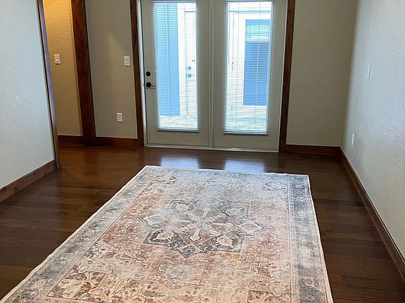 gGound floor bedroom with exterior door and ramp