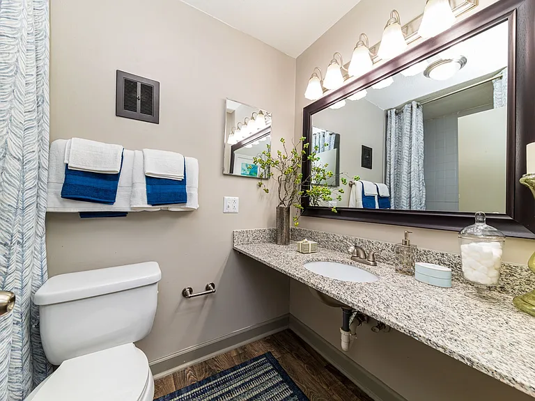 Bright bathroom with granite counters