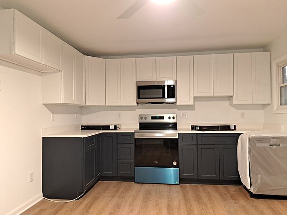 Newly renovated kitchen with new appliances.