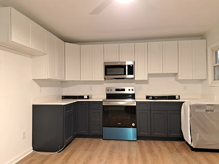 Newly renovated kitchen with new appliances. Refrigerator is not pictured.