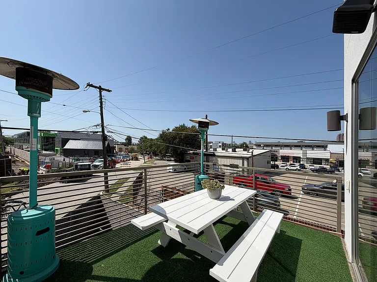 New Henderson Ave development scheduled to be completed Fall 2026.