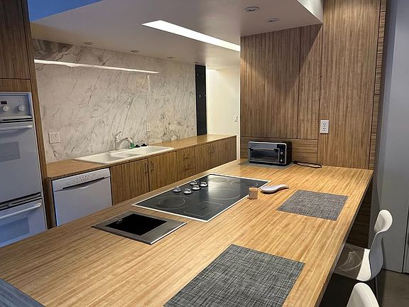 $400 fee--all utilities included for a total of $2200 a month. Property is being rented fully furnished.