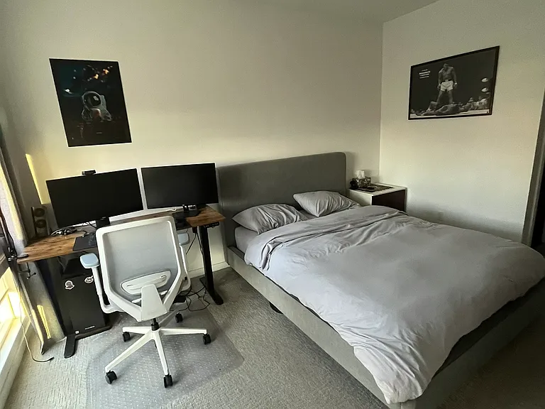 Furnished master bedroom alternate angle.