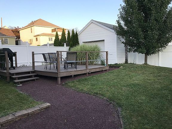 Vinyl fenced in backyard 