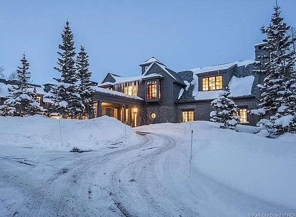 Circular driveway through porte cochere to oversized three car oversized garage!