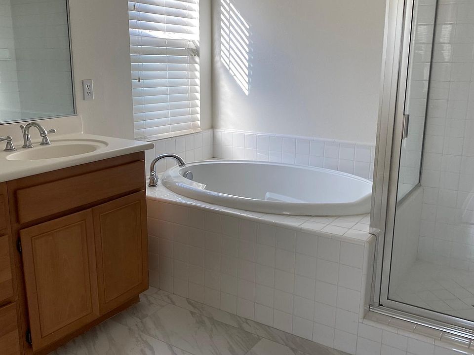 Master bathroom. Spacious bath and shower area.